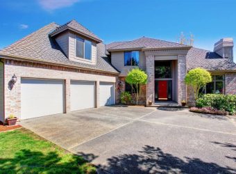 modern house with stamped concrete driveway