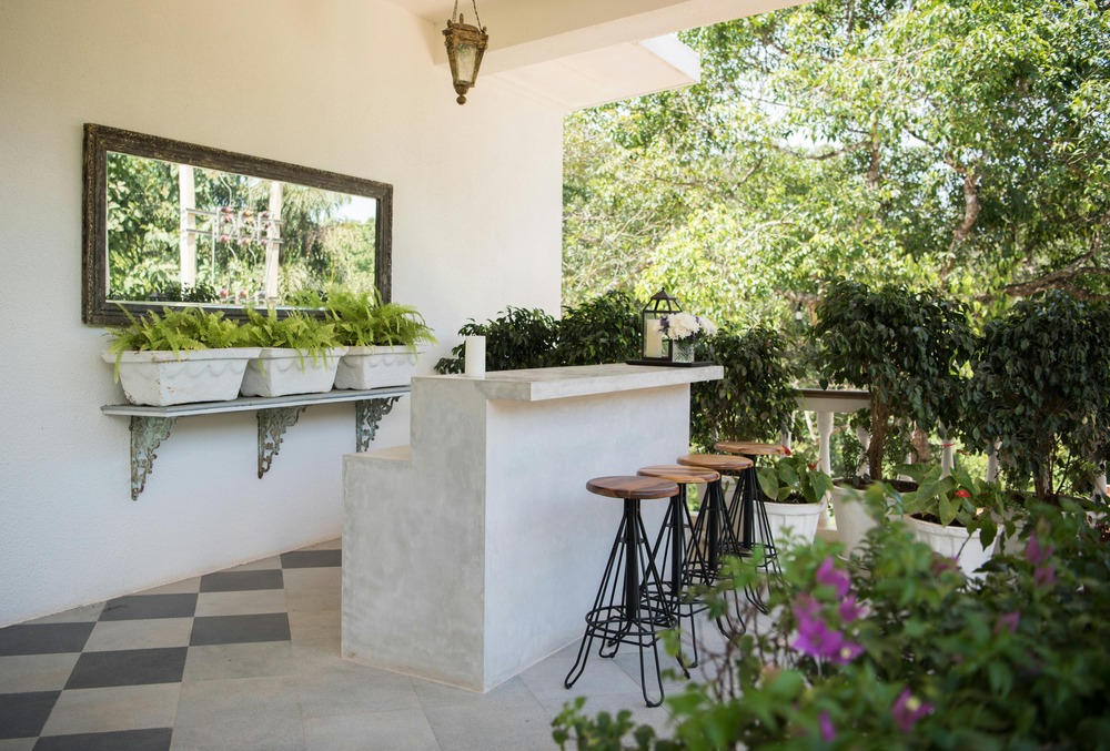 outdoor area with flowers and chairs