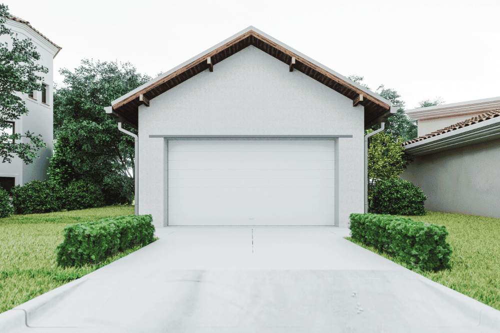 concrete driveway of a white-painted garage